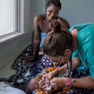 Medical Volunteer treating a patient